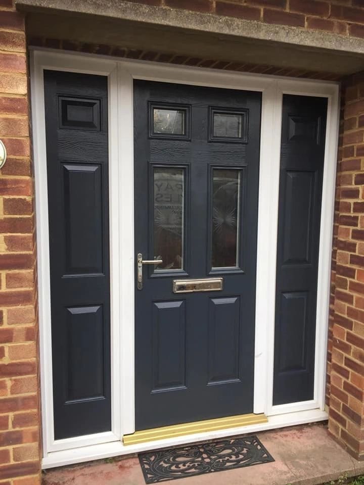 Black front door and side panels after spraying